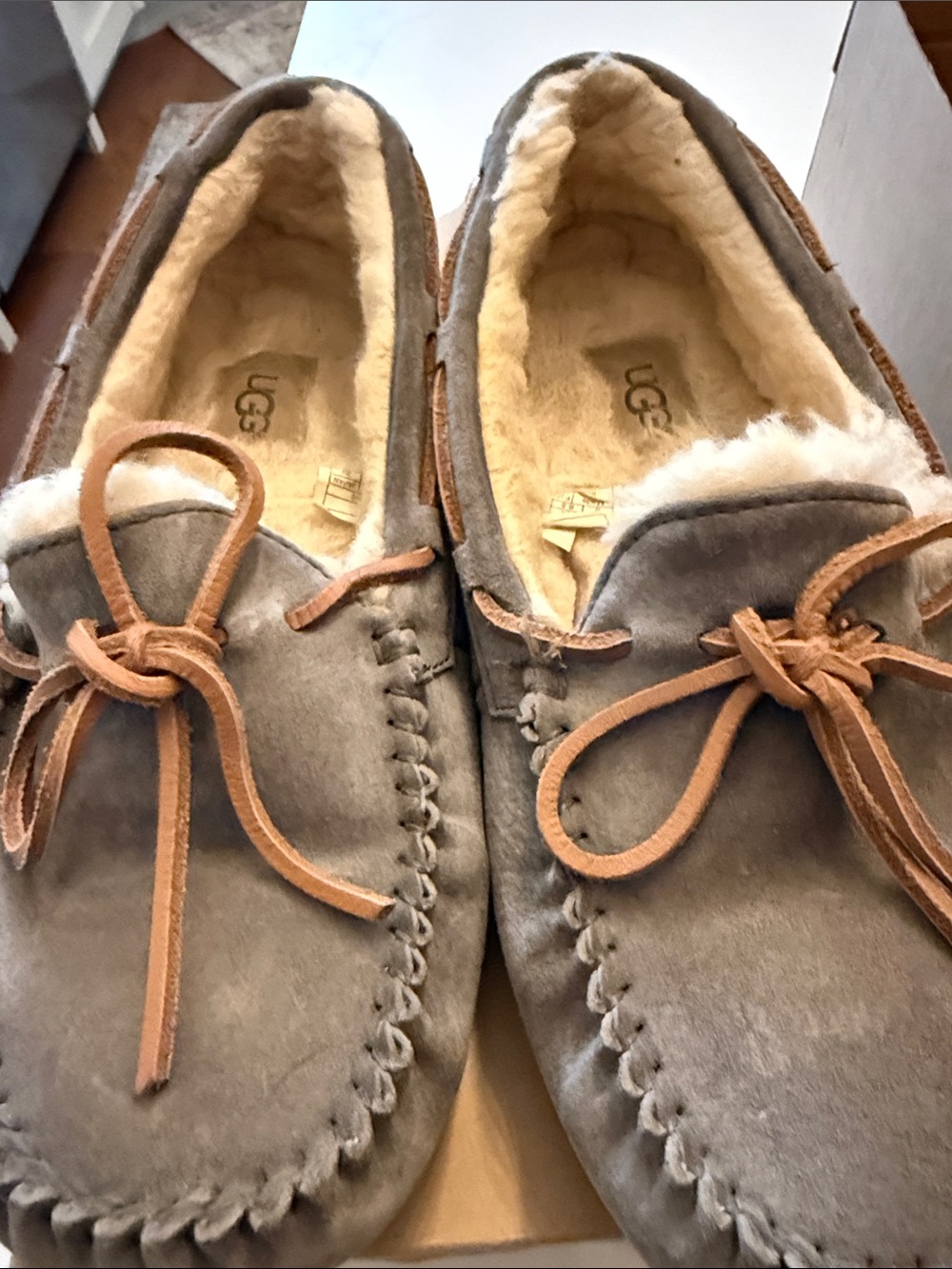 UGG Women’s Gray Suede Shearling Moccasin Slippers with Tan Bow